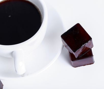 Delicious coffee with ice cubes