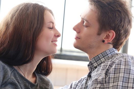 Love, relationship. Beautiful couple at home