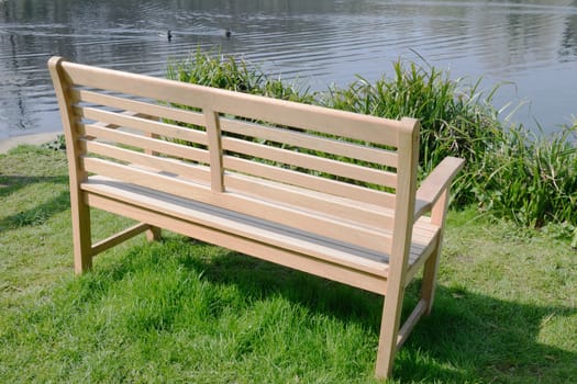 Wooden Bench on waterside