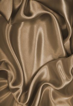 Smooth elegant golden silk or satin can use as wedding background. In Sepia toned. Retro style
