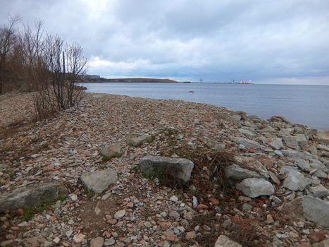 Stony coast. Photo of the evening landscape