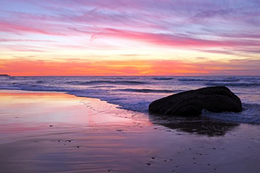 Beautiful sunset at praia Vale Figueiras in Portugal