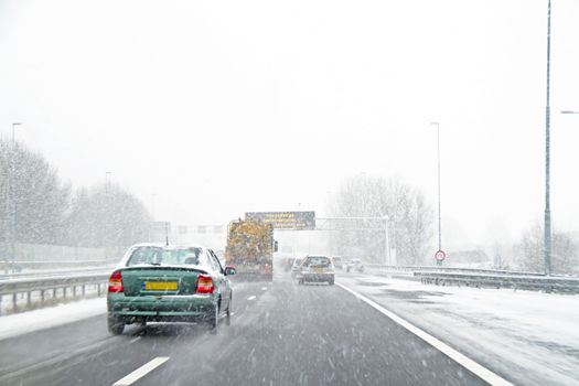 Driving during a snowstorm in Amsterdam the Netherlands
