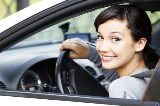 Pretty girl in a car