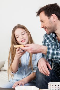 Father offering him a toast to his daughter
