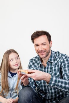 Man holding a toast for his daughter