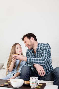 Man gives a toast to his daughter