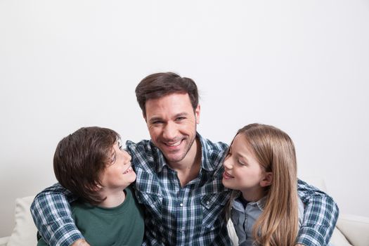 Man sitting with your two sons