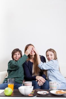 Happy family having the breakfast together