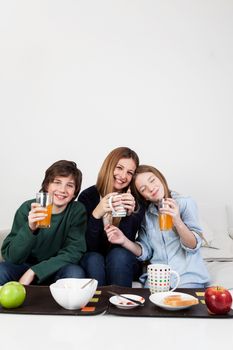 Happy family having the breakfast