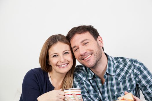 Couple smiling in breakfast