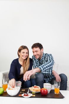 Beutifull couple having a breakfast