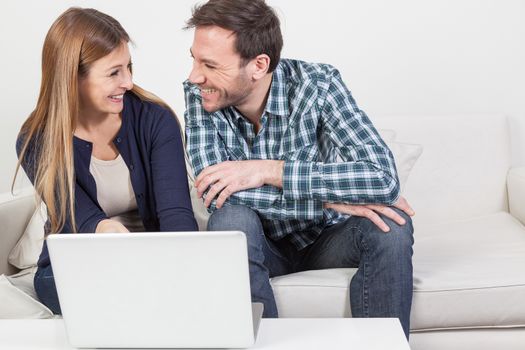 Couple in love using the computer