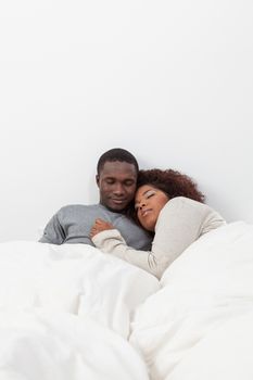 African couple sleeping