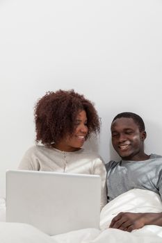 Black couple in love using the computer