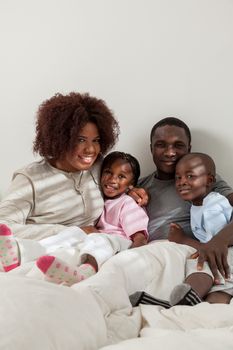 Black family in the bed