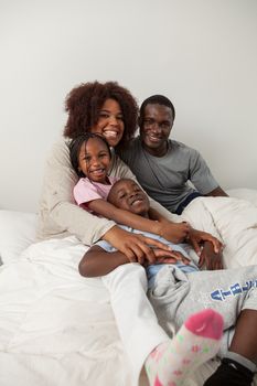 Black family in the bed