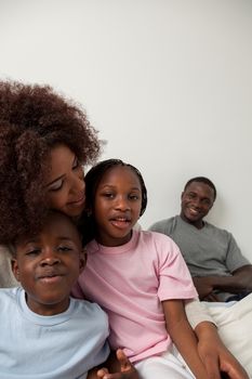 Black family in the bed