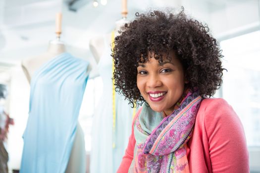 Portrait of confident female fashion designer