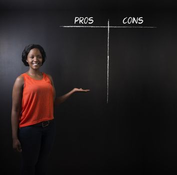 South African or African American woman teacher or student thinking pros and cons decision list chalk concept blackboard background