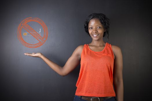 No smoking tobacco addict South African or African American woman teacher or student on blackboard background