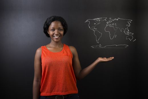 Confident beautiful South African or African American woman teacher or student with chalk geography world map on blackboard background