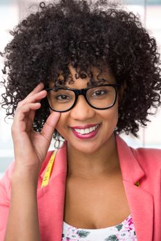 Close up portrait of confident female fashion designer