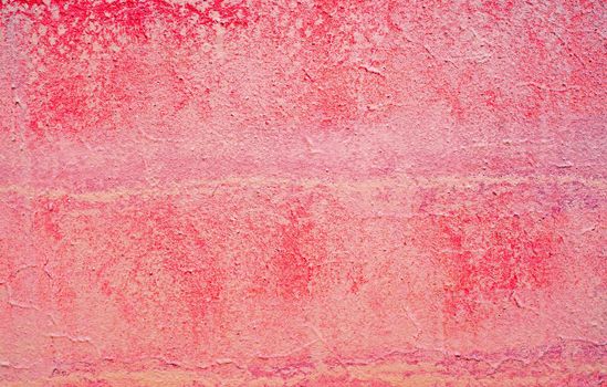 Plastered red-purple wall as an abstract background                               