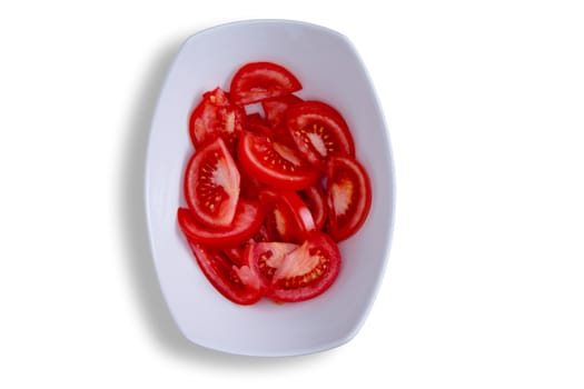 Close up Thin Sliced of Healthy Red Tomatoes on White Bowl, Isolated on White Background. Captured in High Angle View.