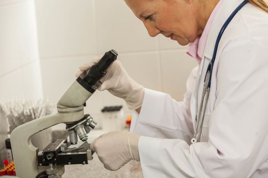 woman with a microscope