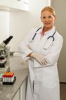 woman looking at the camara in a laboratory