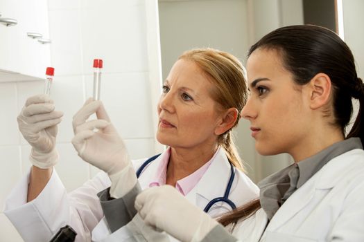 couple concentrated in a lab