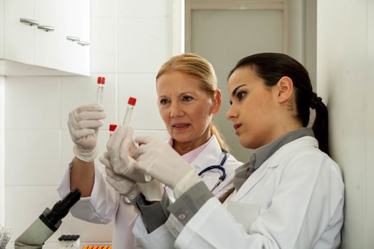 couple concentrated in a lab