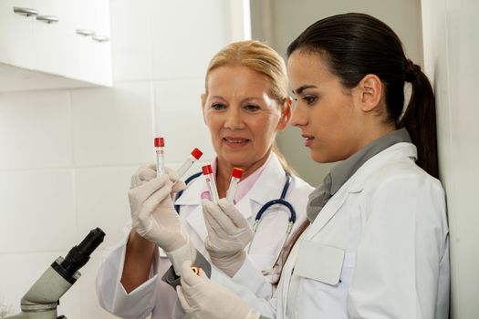 couple concentrated in a lab