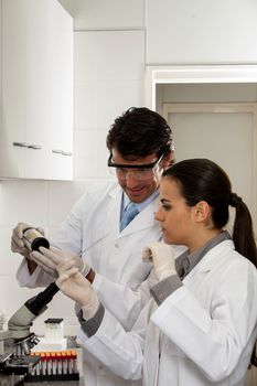 couple doing an experiment in the lab