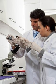 couple doing an experiment in the lab