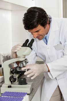 scientific doing an experiment