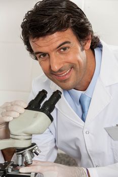 scientific smiling looking at the camera
