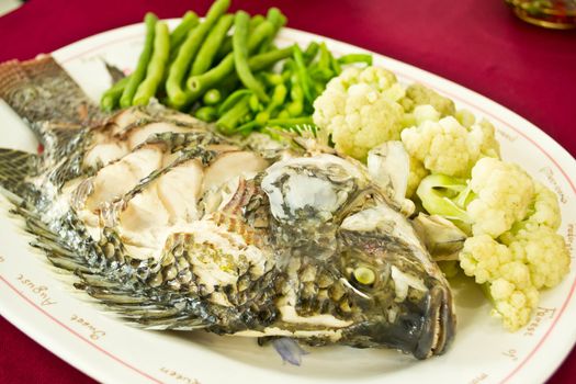 Steamed Tilapia fish garnish and vegetables