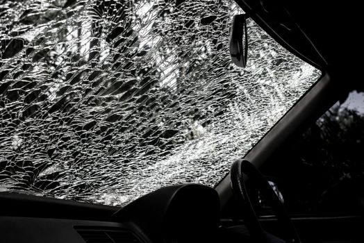 Damaged glass (car windshield) inside car