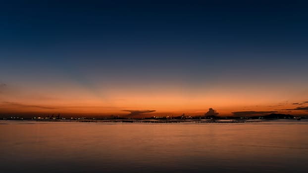 Sunset sky at sea with Si Chang island background