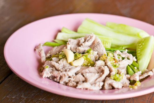 boiled pork with lime ,garlic (pork with lime) on the plate
