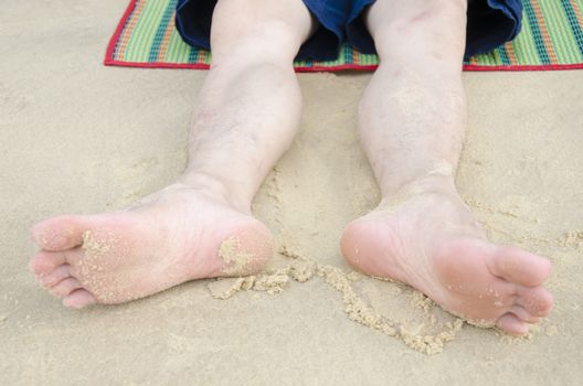 Rest foot on the beach, Summer time