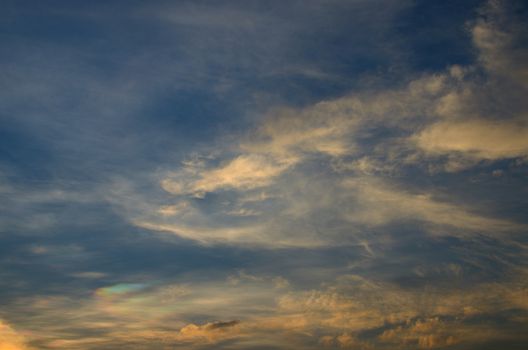 Sunset sky with Iridescence and cloud, Thailand