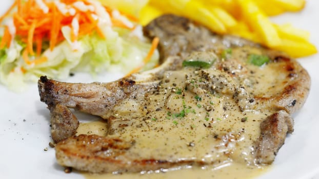 Pork steak with pepper sauce