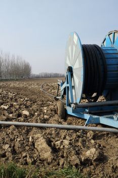 Irrigation pipe useful to scatter the seeds in a field