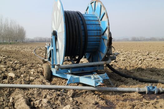 Irrigation pipe useful to scatter the seeds in a field