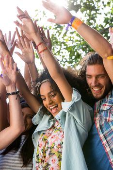 Music fans enjoying live music on a sunny day