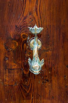 ornamental swing to knock on doors, used as the modern bells