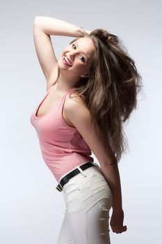 Beautiful Teenage Girl with Long Brown Hair Smiling